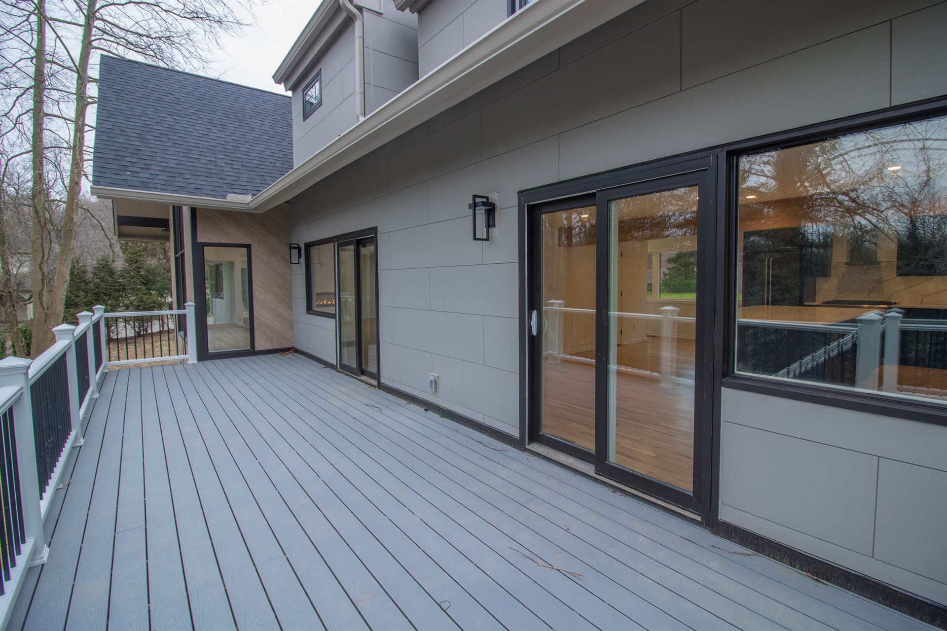 Large deck on back of house featuring ArchitecturalBlock panels