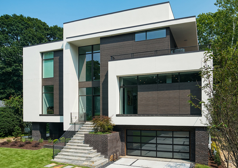 Modern two-story angular home with fiber cement siding