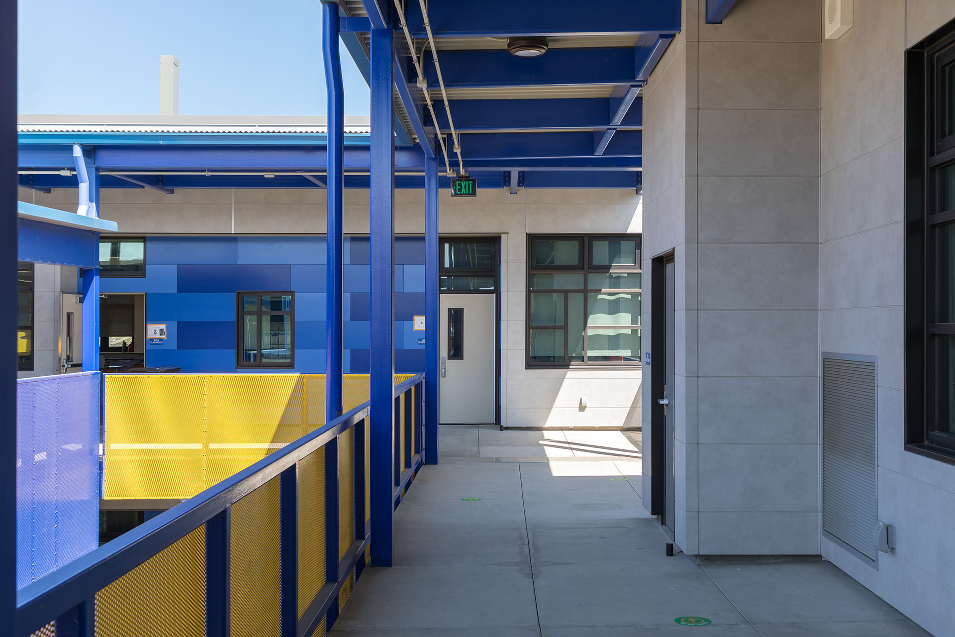 Interior of Madison Park Academy featuring multi-colored blue Illumination and IndustrialBlock wall panels
