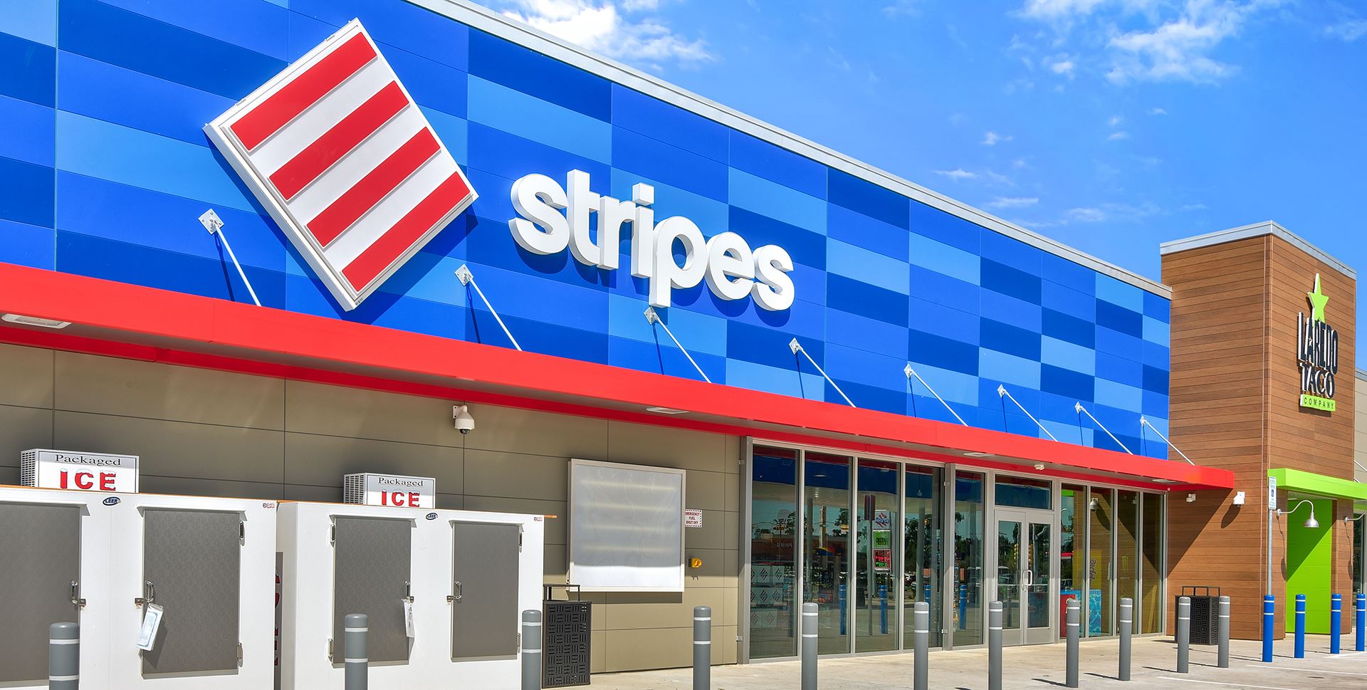 Front of Stripes convenience store with colorful blue Illumination panels
