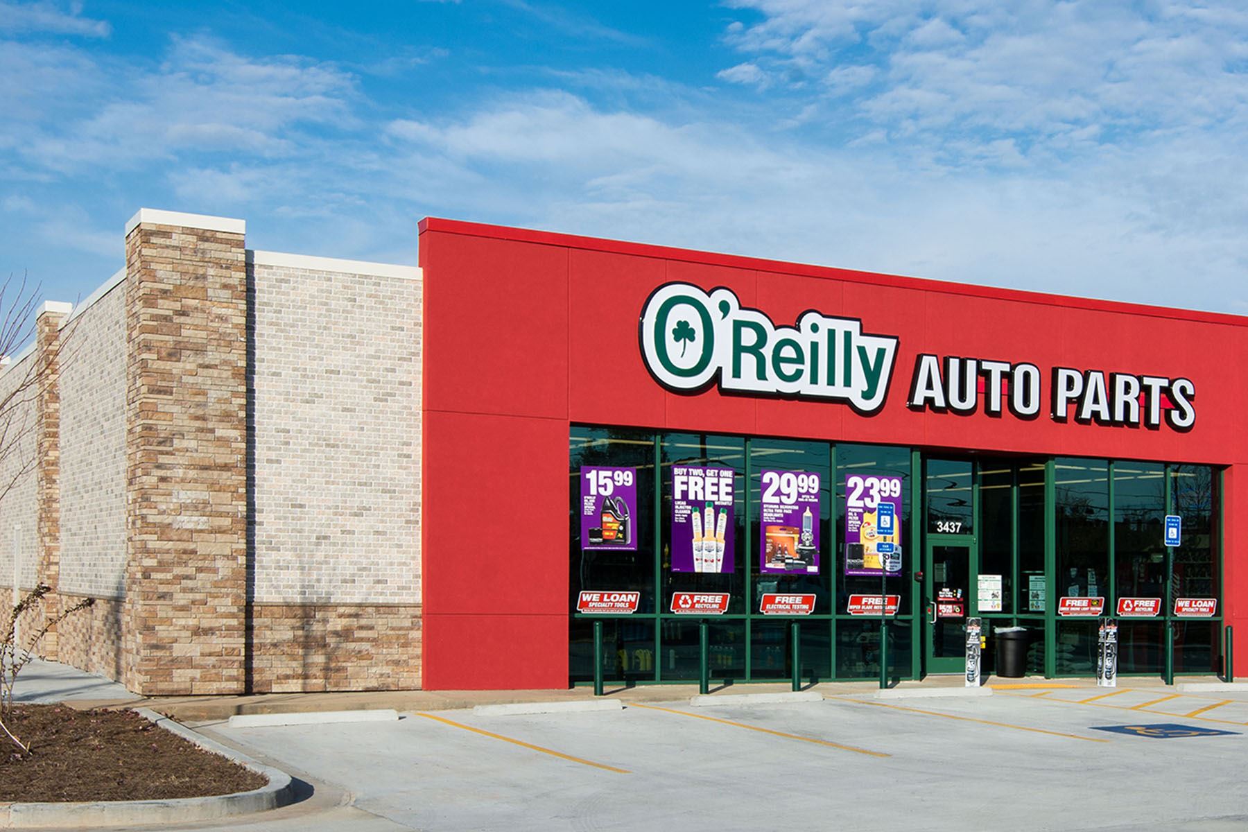 O'Reilly's Auto Parts with red entrance and LedgeStone